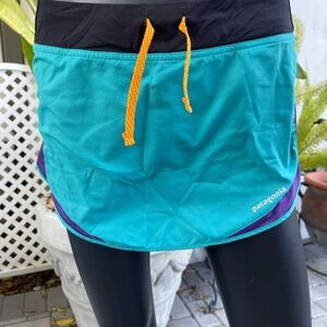 Patagonia Teal Athletic Skort with Purple Accents and Orange Drawstring